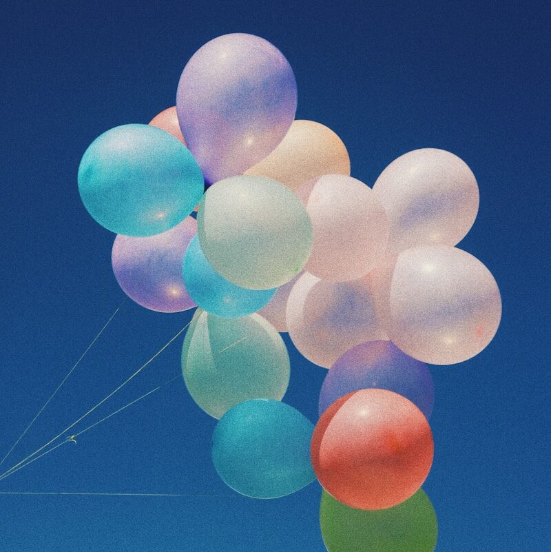 white, blue, and purple balloons